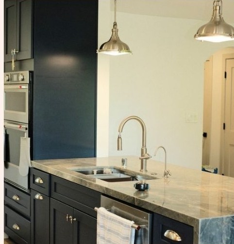 Completed dark-cabinet kitchen detail